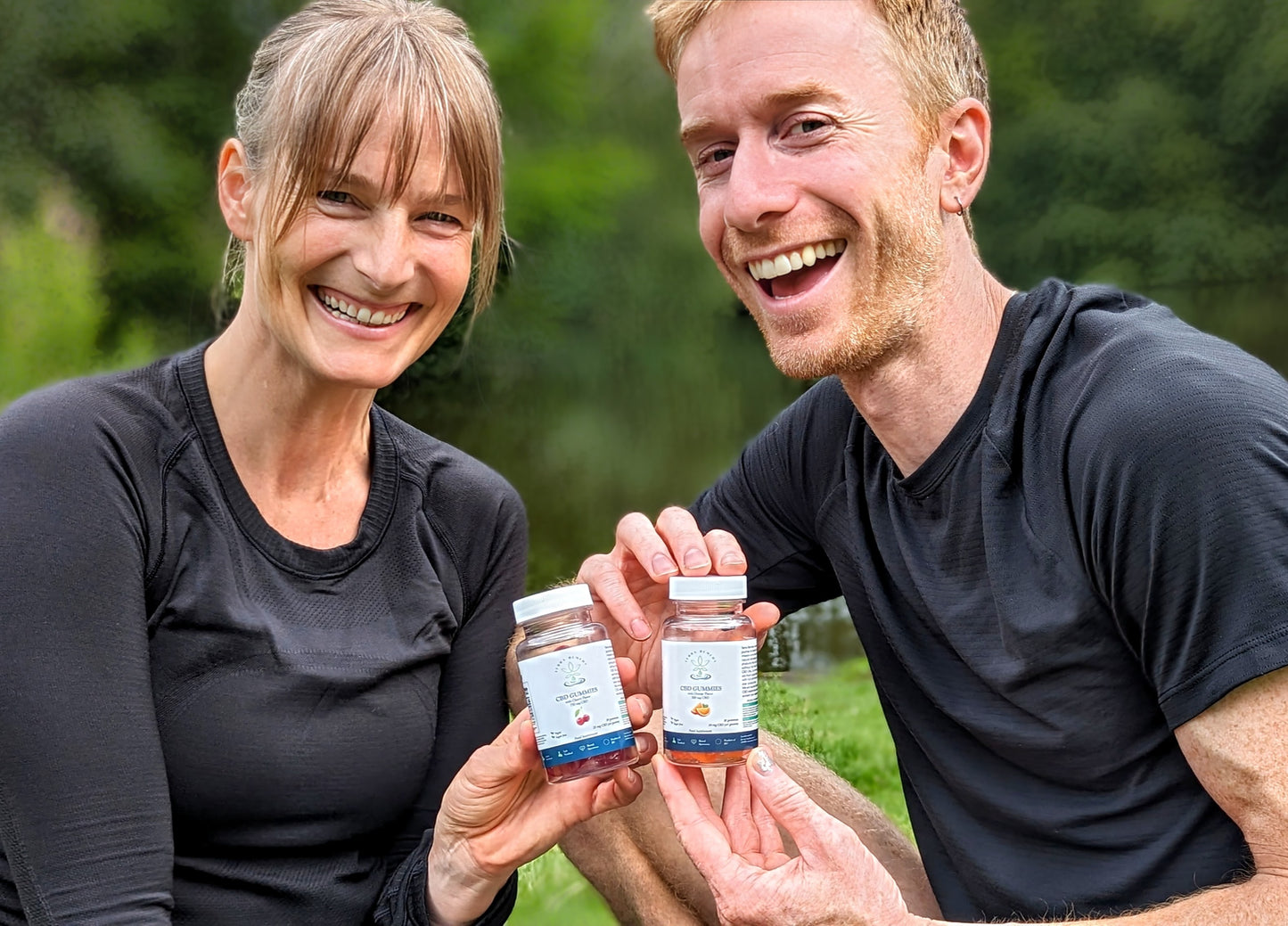 
                  
                    A smiling couple holding bottles of Terra Remedy CBD gummies, one with cherry flavor and the other with orange flavor. Both products are vegan, sugar-free, and contain broad-spectrum CBD for convenient and flavorful wellness.
                  
                